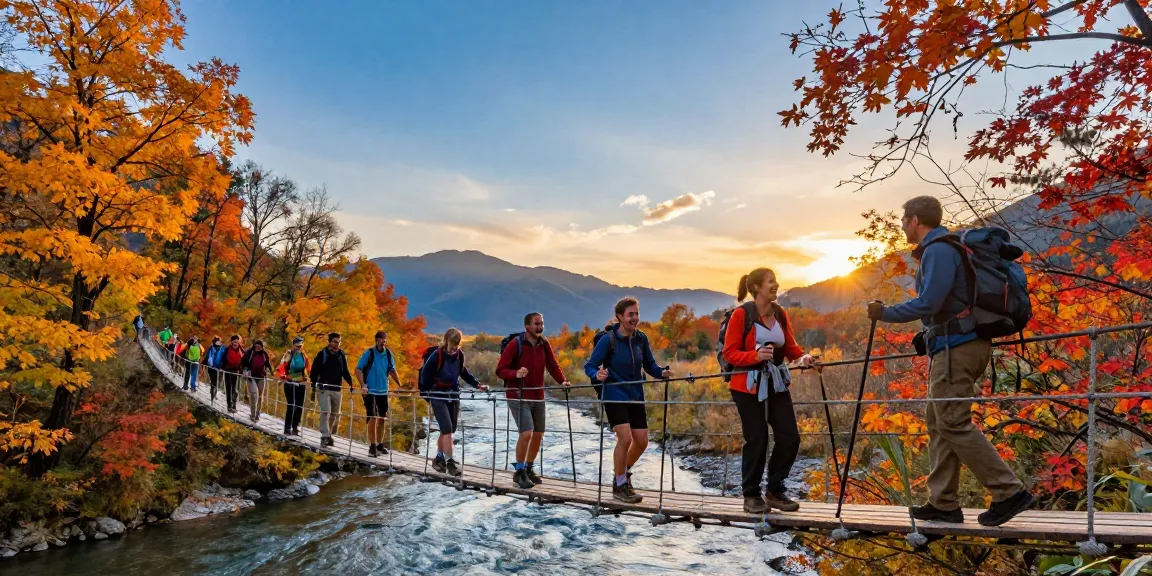 Group of hikers crossing a River Rope Bridge during sunset, enjoying the scenic views.